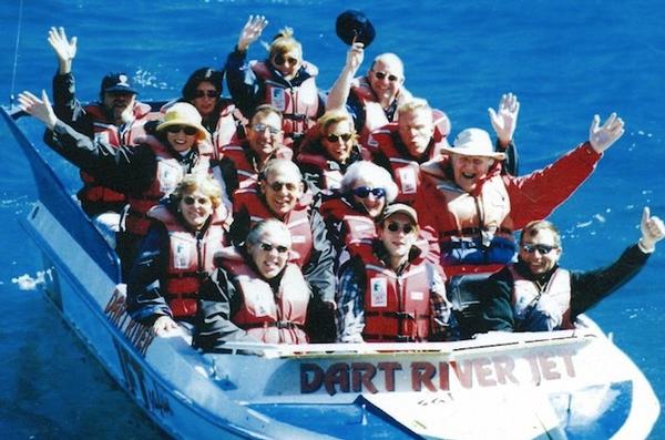 Kiwi icon Sir Edmund Hillary (second row R) and his wife Lady June enjoy a Dart River Jet Safari on their honeymoon in December 1989.